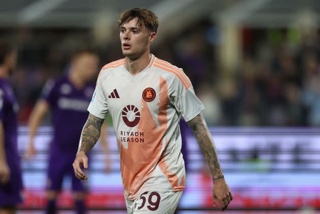 Nicola Zalewski of AS Roma (L) in action during the Serie A match between AS Roma and Bologna FC at Olympic Stadium on April 28, 2024 in Rome, Italy.