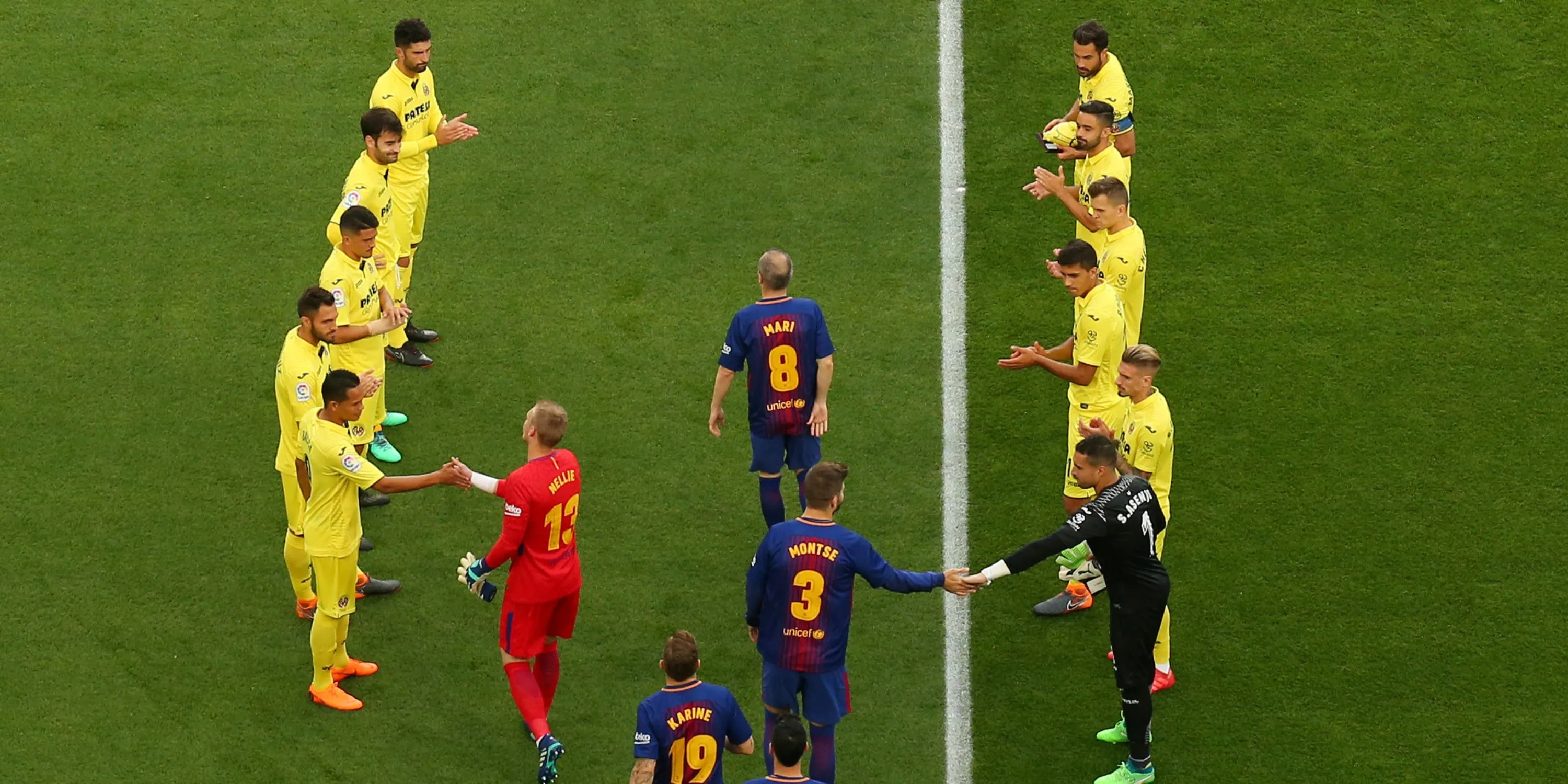 Barcelona players receiving a guard of honour